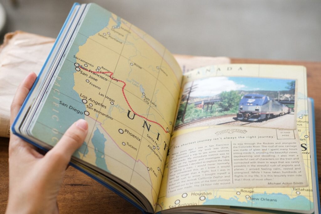 A person flips through a travel journal.